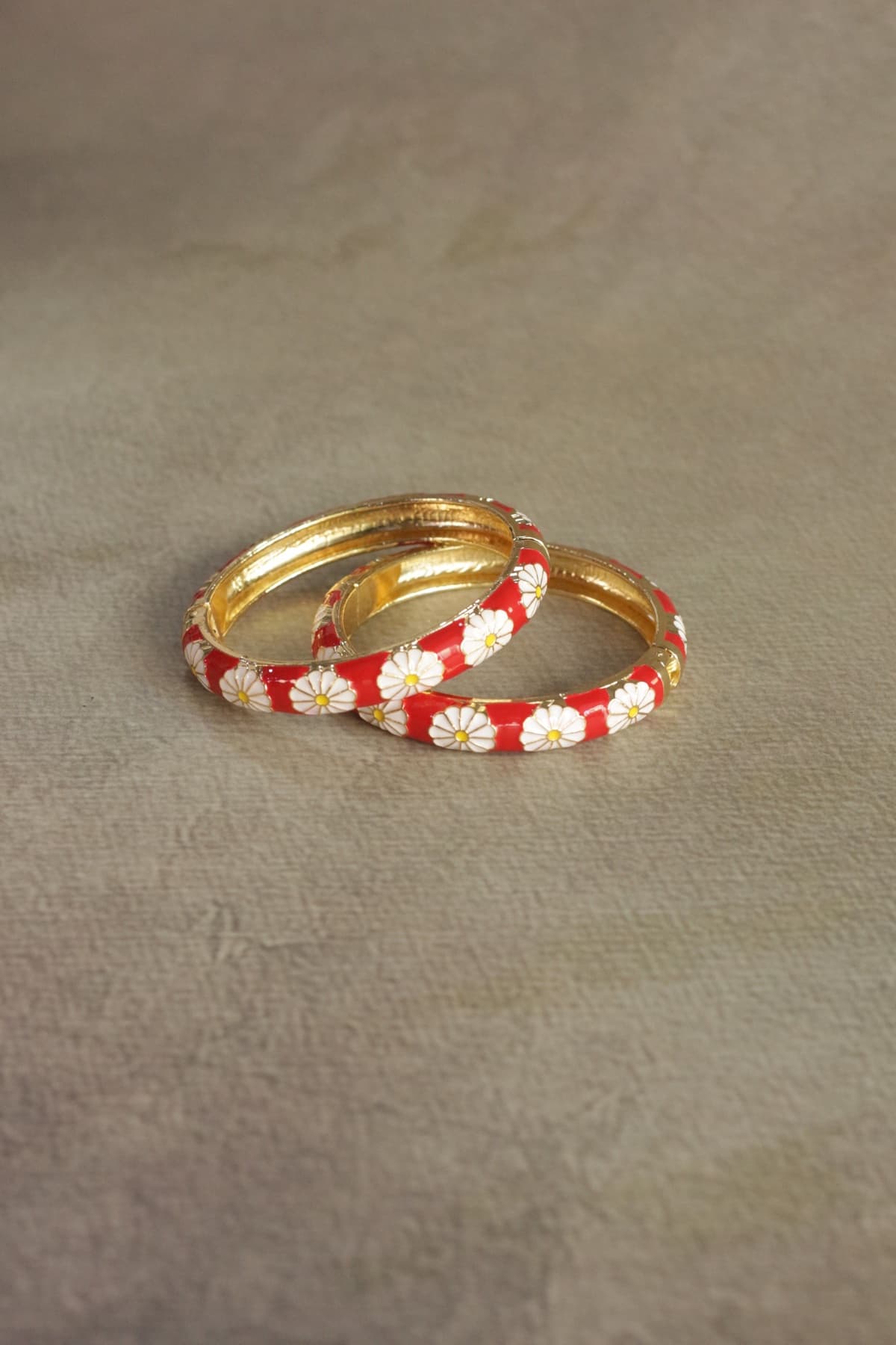 Red floral Rangat bangles from the brand photoshoot